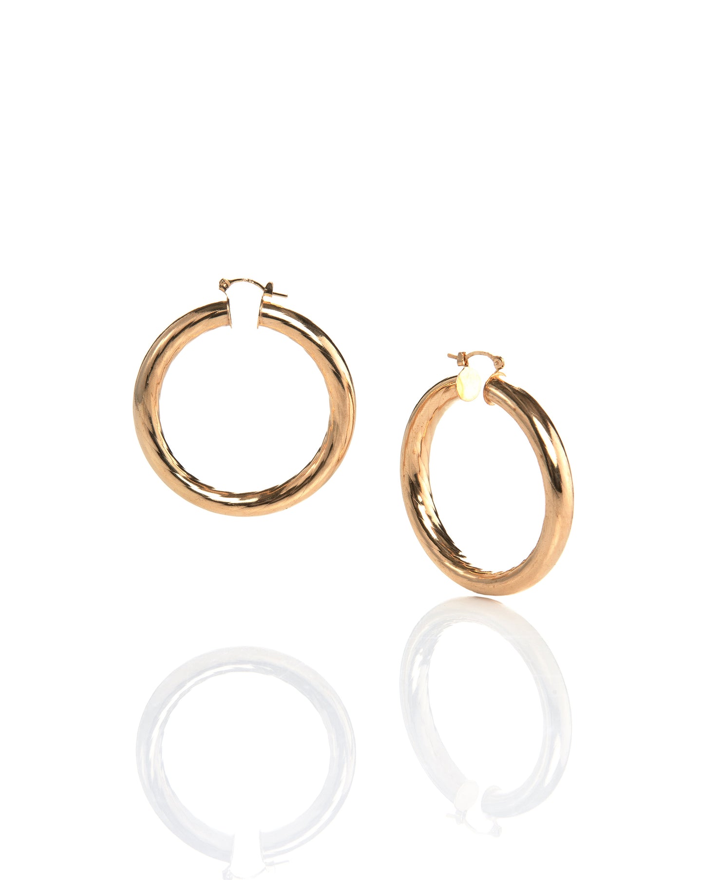Thick gold hoop earrings